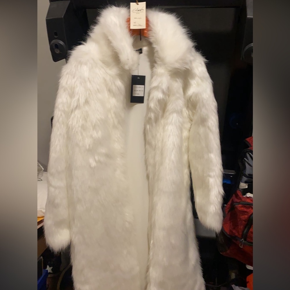 size m/l fur coat— super long! could wear over formal dress for a parade.